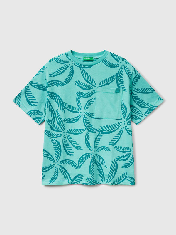 Camiseta verde con estampado tropical Niño