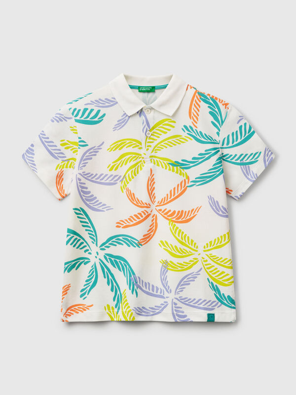 Polo blanco con estampado tropical Niño