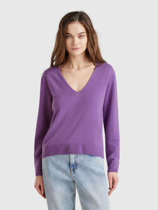 Jersey de pura lana merina con escote de pico Mujer