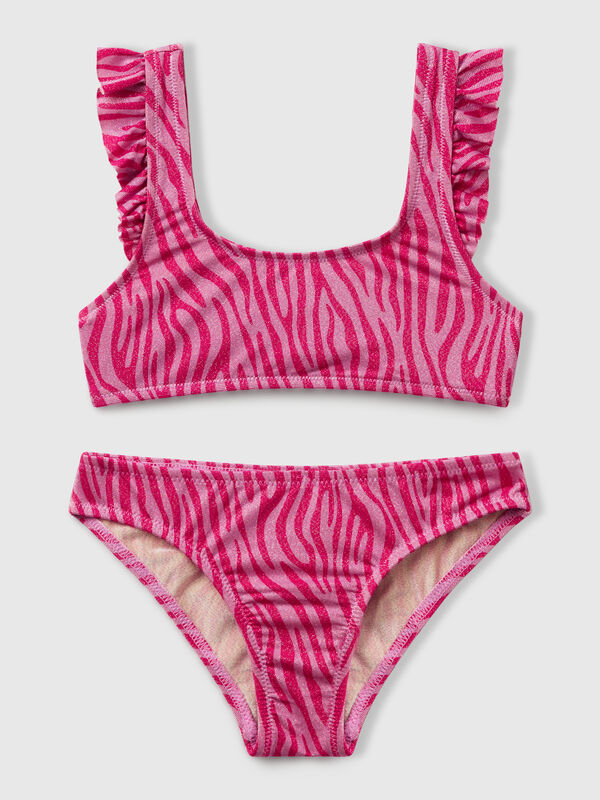 Bikini de playa con estampado animal. Niña