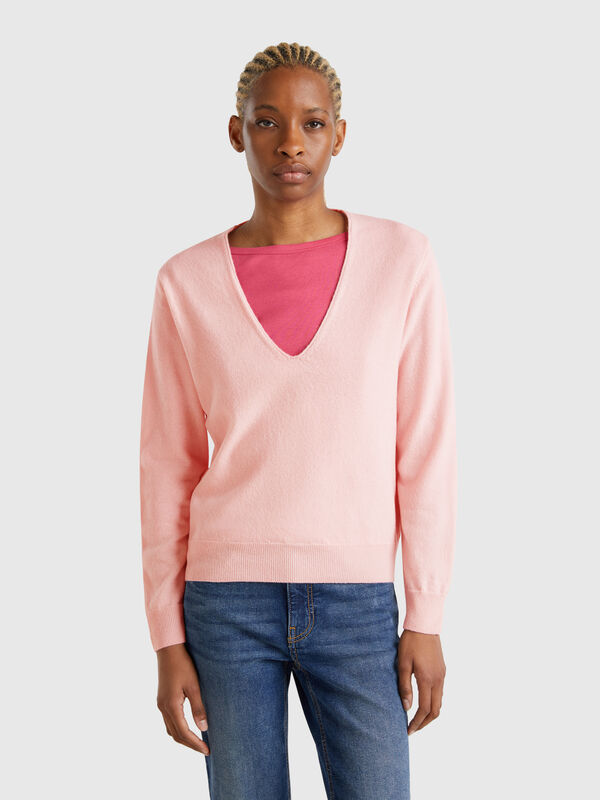 Jersey de pura lana merina con escote de pico Mujer
