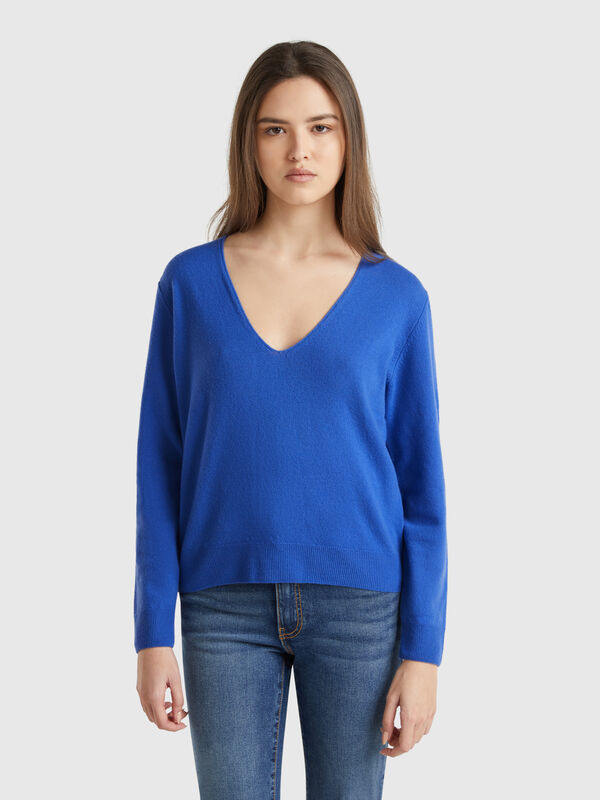 Jersey de pura lana merina con escote de pico Mujer