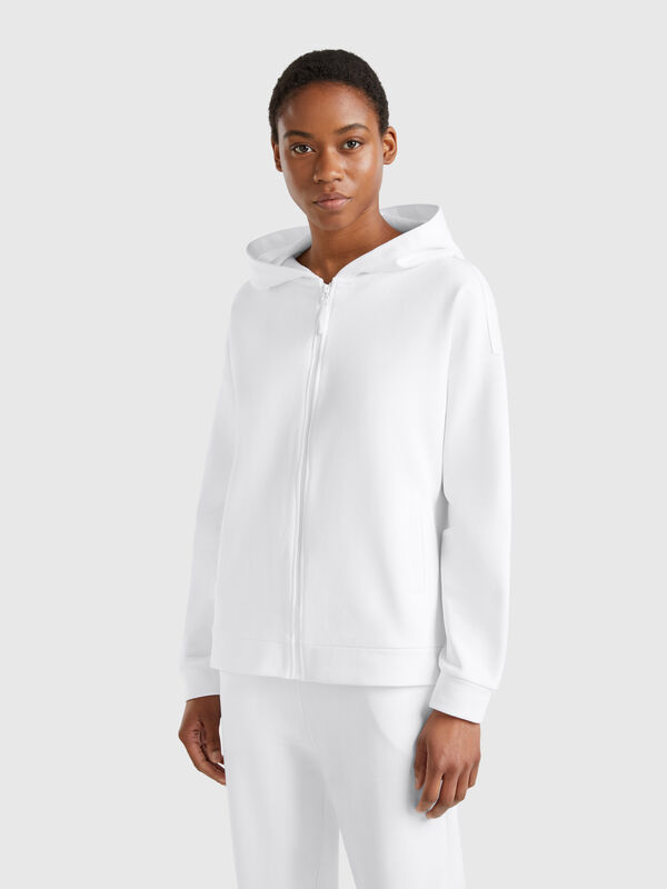 Sudadera 100% algodón con cremallera y capucha. Mujer